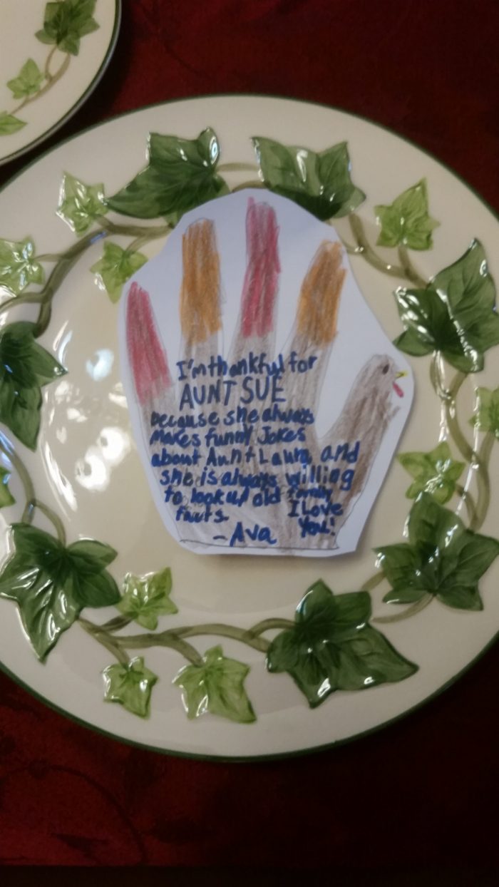 "because she always makes funny jokes about Aunt Laura and she is always willing to look up old family facts"